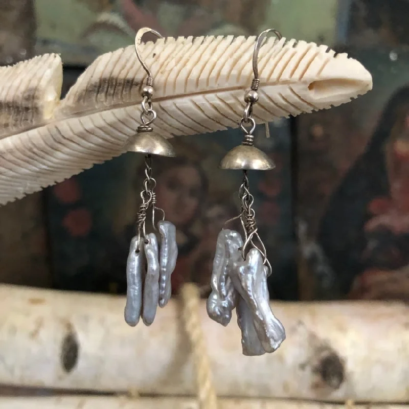 Earrings with Dangling Freshwater Pearls in Sterling Silver